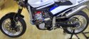 2009-Husqvarna-SM450RR-L-Naked-730x485.jpg